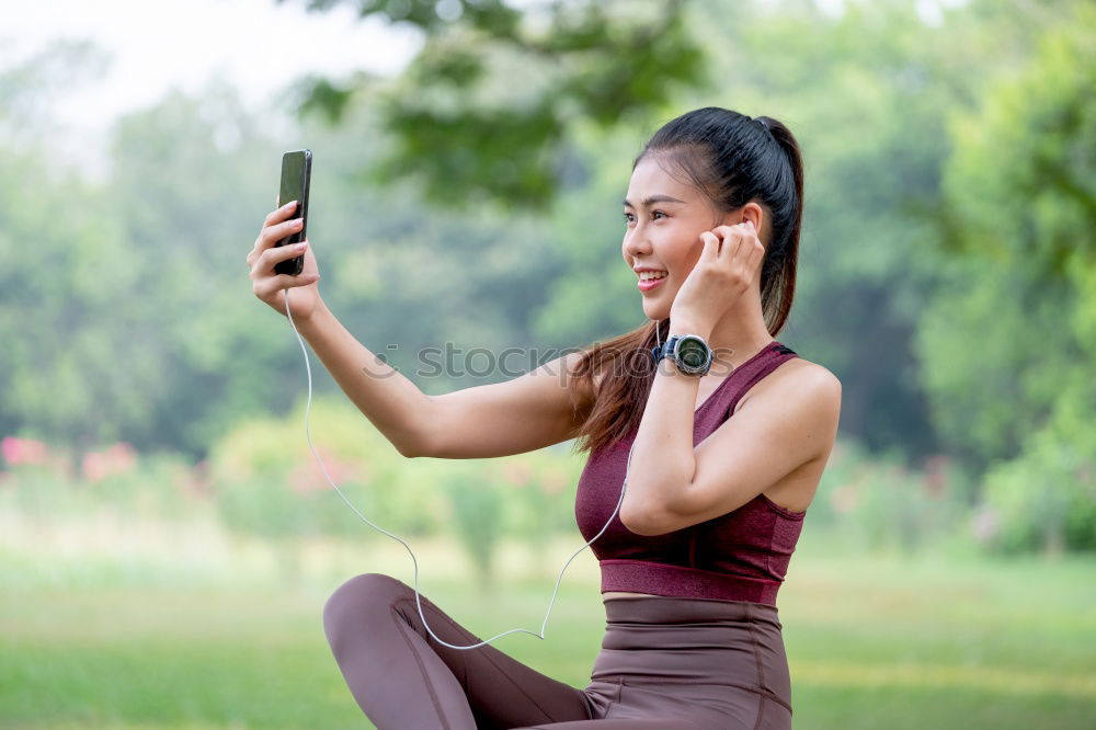 Similar – Image, Stock Photo African woman listening to music with earphones and smart phone