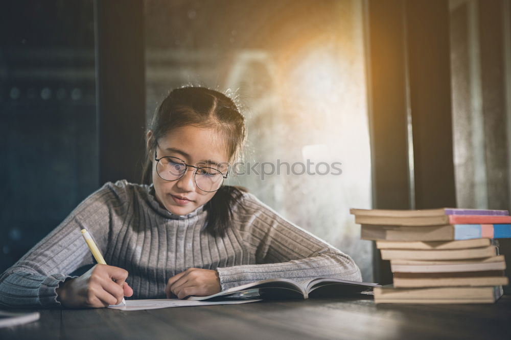 Similar – Image, Stock Photo Pretty woman writing at table