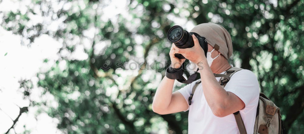 Similar – Image, Stock Photo Woman taking photo in misty woods