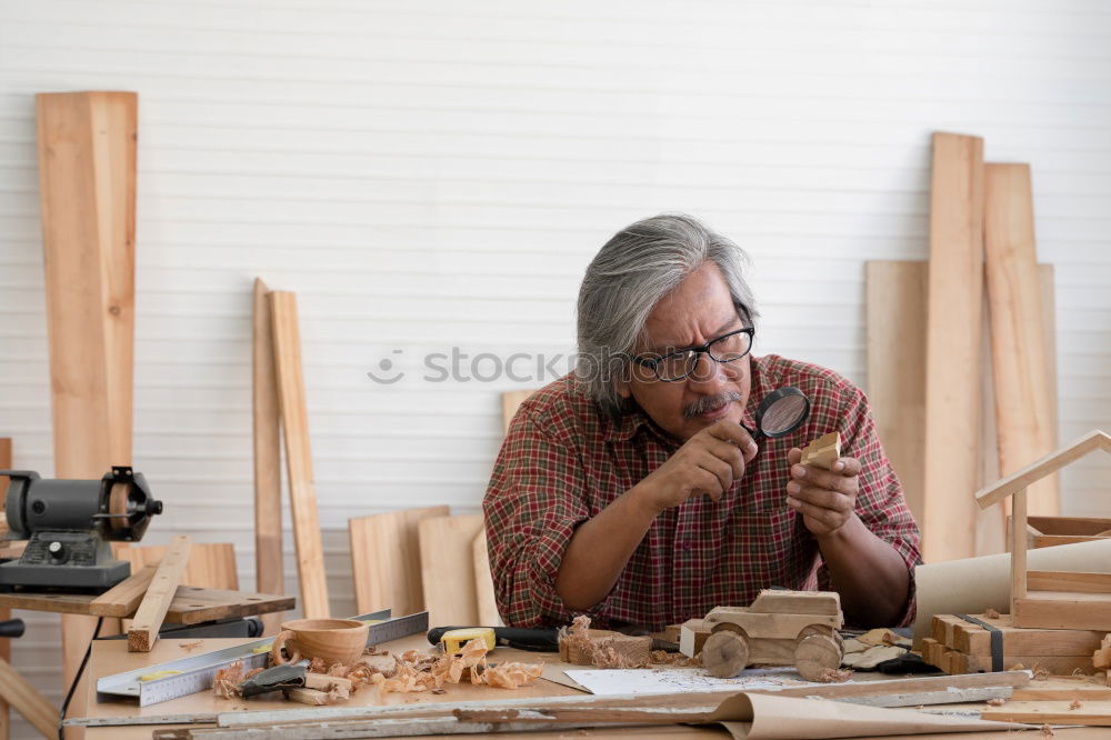 Similar – Portrait of senior carpenter.