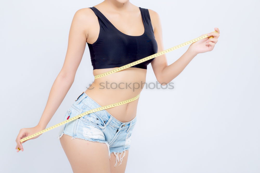 Similar – Image, Stock Photo Young sporty woman doing exercises with a latex band