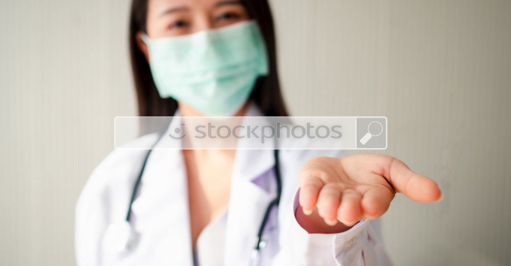 Similar – Image, Stock Photo Female doctor putting on her protective gloves