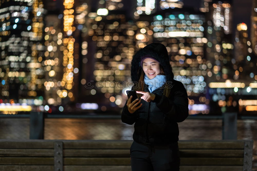 Similar – Image, Stock Photo Young people using tablet computer at home. They looking at pictures standing by the window in the evening. City lights outdoor