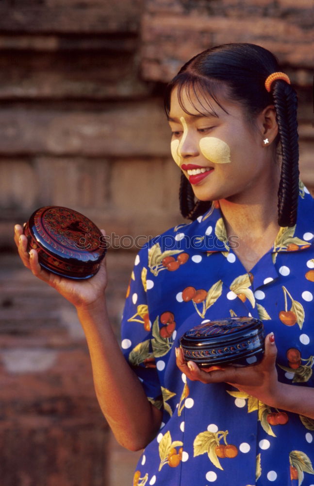 Similar – Woman fanning herself.