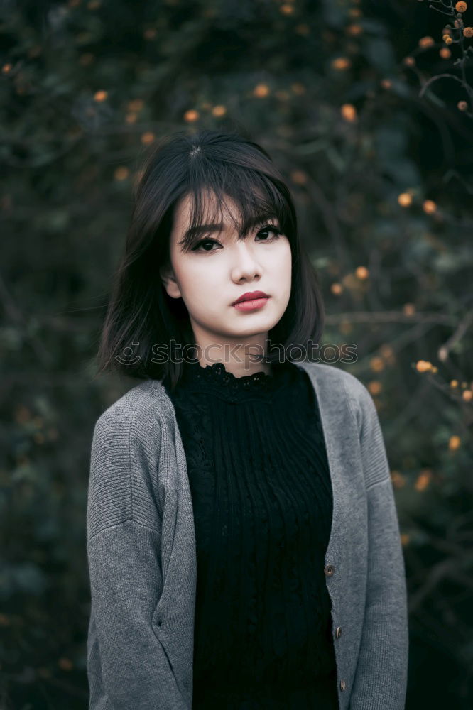 Similar – Young brunette woman sitting at home