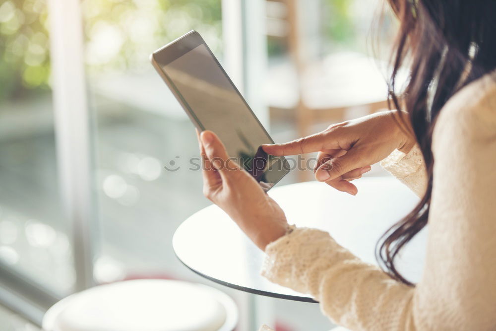 Similar – Woman hands holding credit card and smartphone