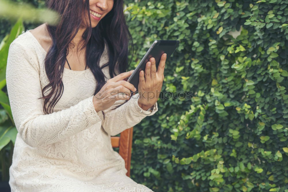 Similar – Image, Stock Photo young woman sitting at home sofa using mobile phone