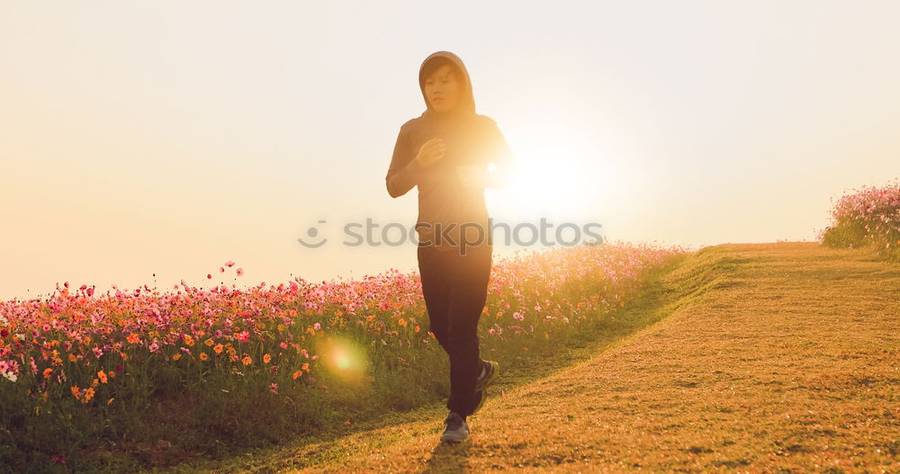 Similar – Young woman posing on a hill