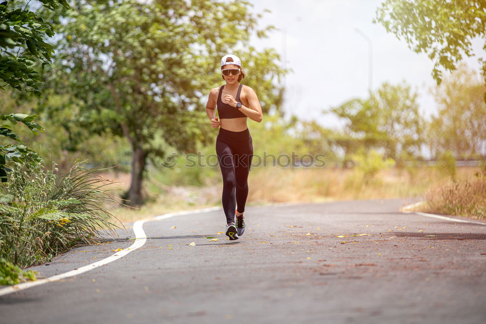 Similar – Image, Stock Photo athletic woman running outdoors