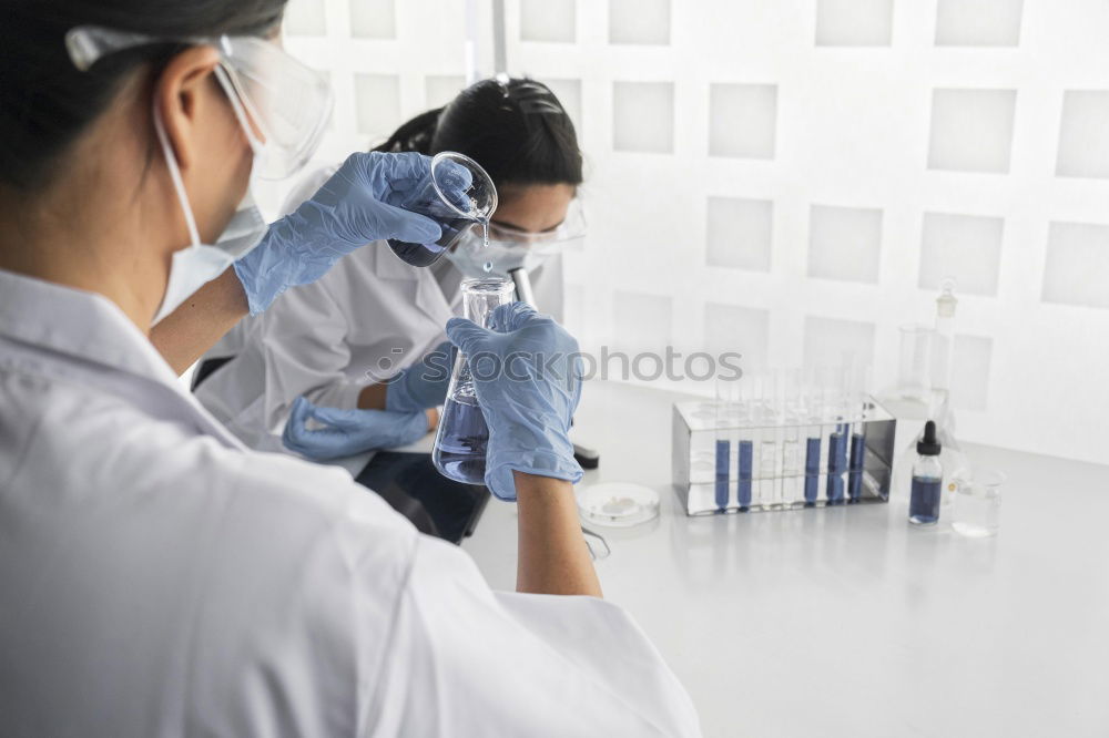 Similar – Image, Stock Photo Women standing and working in lab