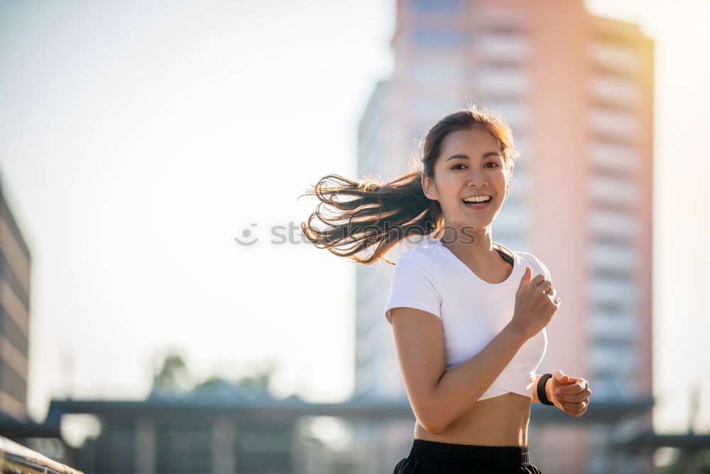 Similar – Young Woman working out outdoors and having fun