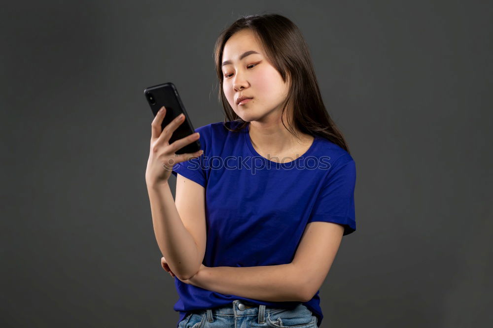 Similar – Image, Stock Photo young asian woman texting with smartphone