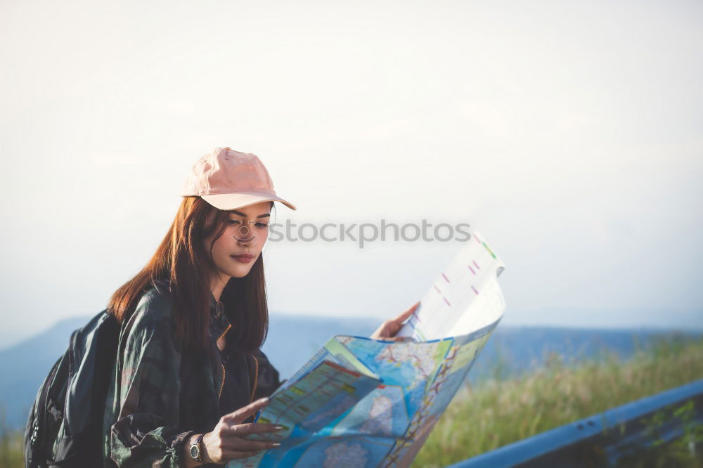 Similar – Image, Stock Photo Older woman looks at black and white picture of herself as a child