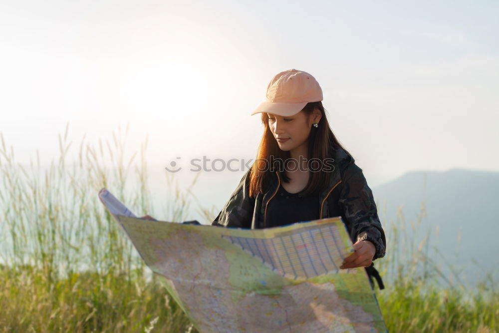 Similar – Image, Stock Photo Man navigating on road in woods