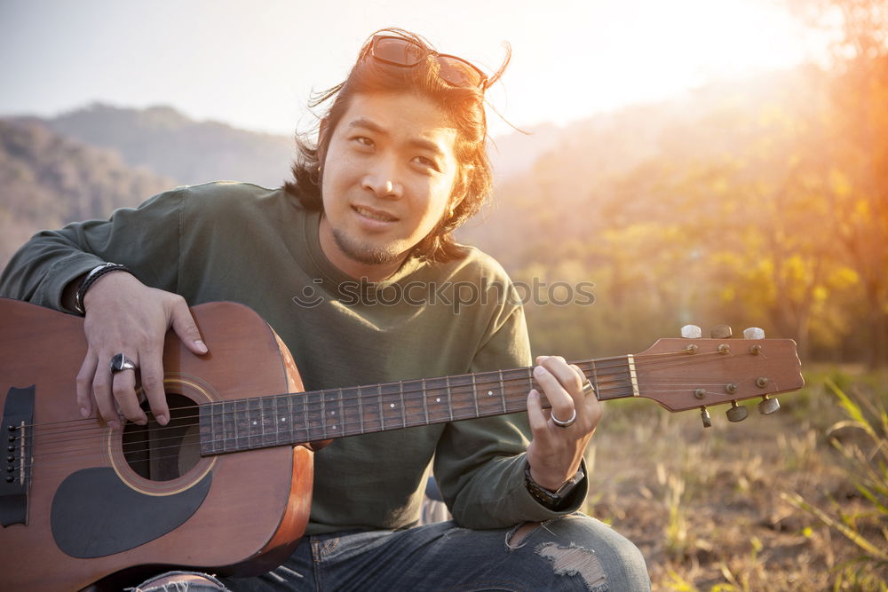 Similar – Image, Stock Photo outdoor photo session with a bass player and his instruments