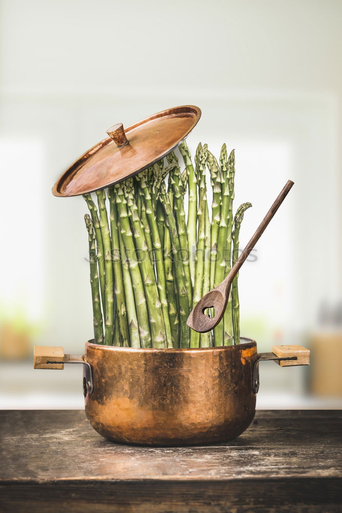 Image, Stock Photo Green asparagus in pot with cooking spoon