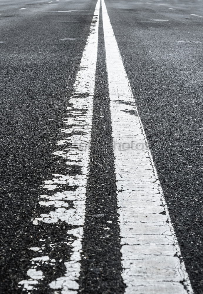 Similar – Man walking on road