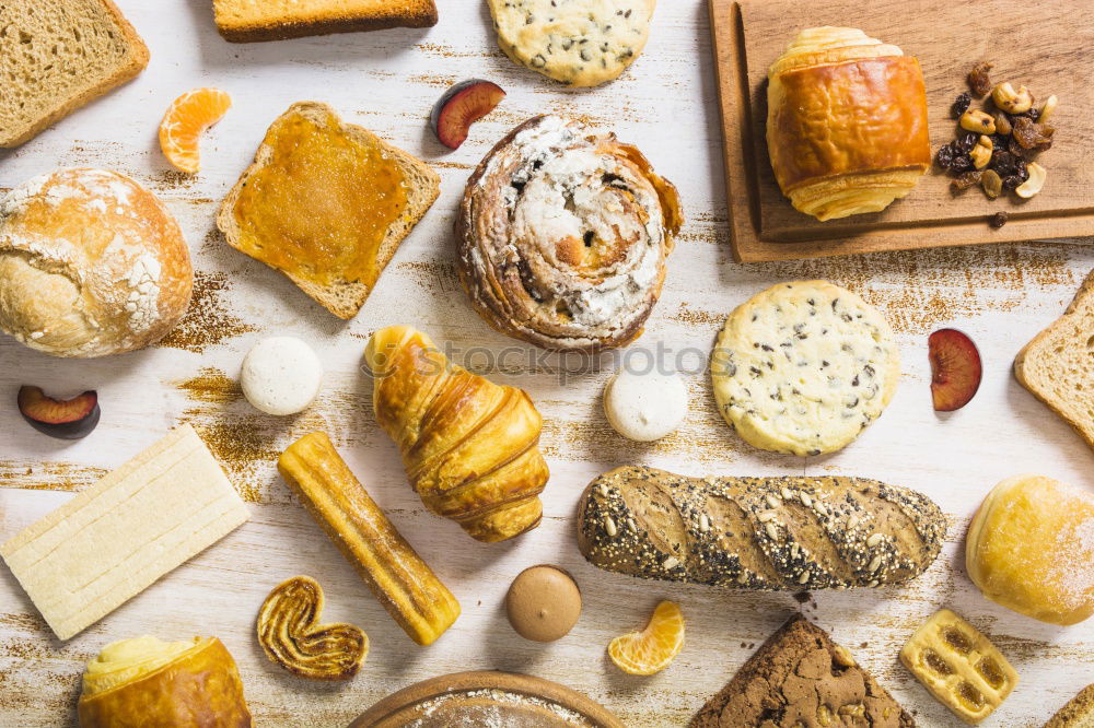 Similar – fresh bread and baked goods on wooden