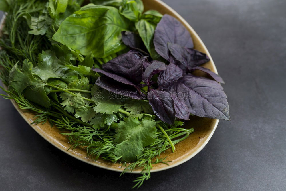 Similar – spinach in a round cast-iron frying pan