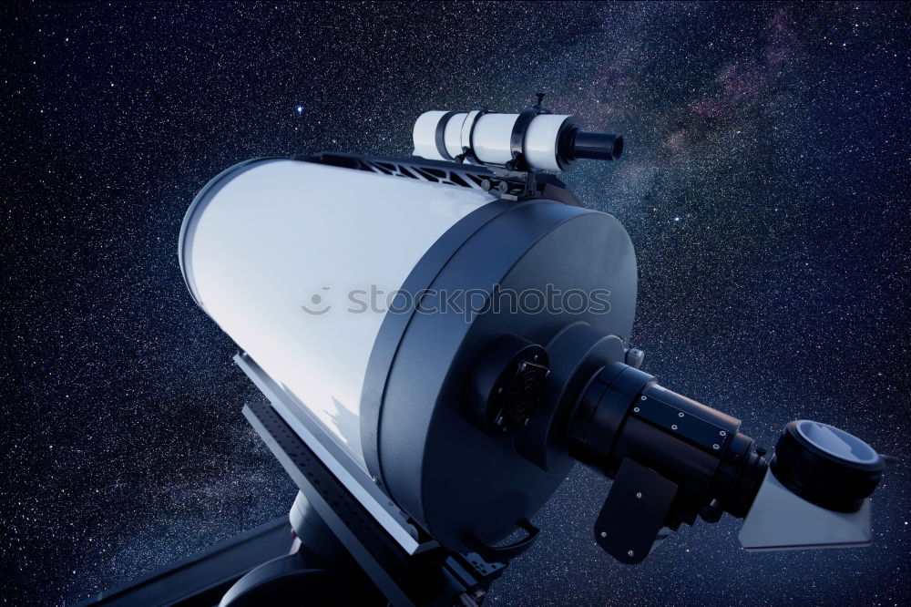 Optical telescope against night starry sky