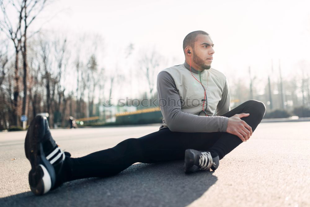 Similar – Image, Stock Photo Young man working out doing push-ups on a wooden park bench