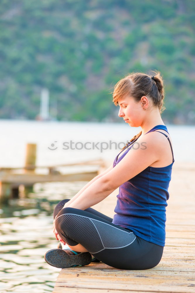 Similar – Image, Stock Photo Attractive woman working out on a wooden deck