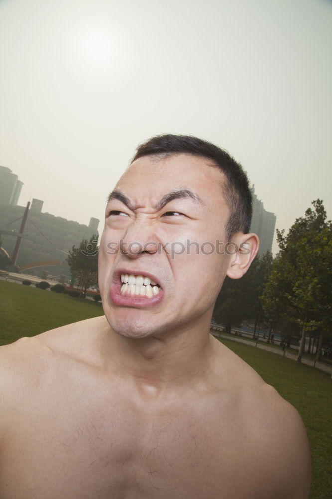 Similar – Image, Stock Photo Young man with flower in mouth
