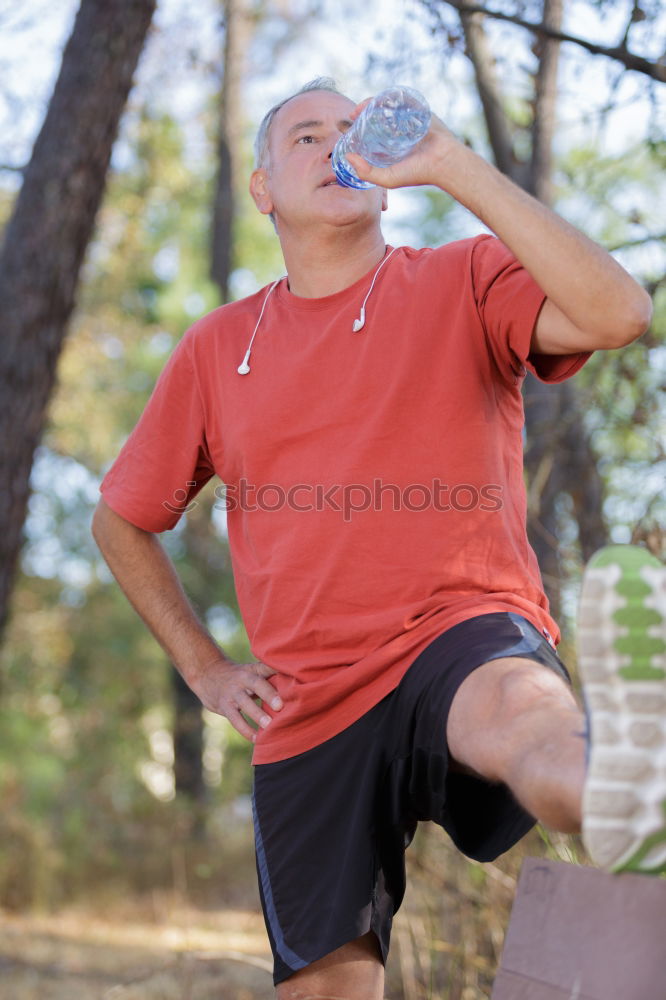 Similar – Senior runner man sitting after jogging in a park