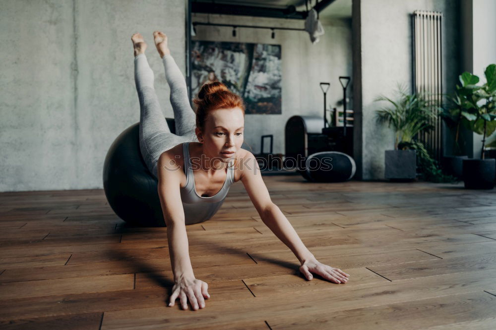 Similar – Image, Stock Photo Woman using fascial roller