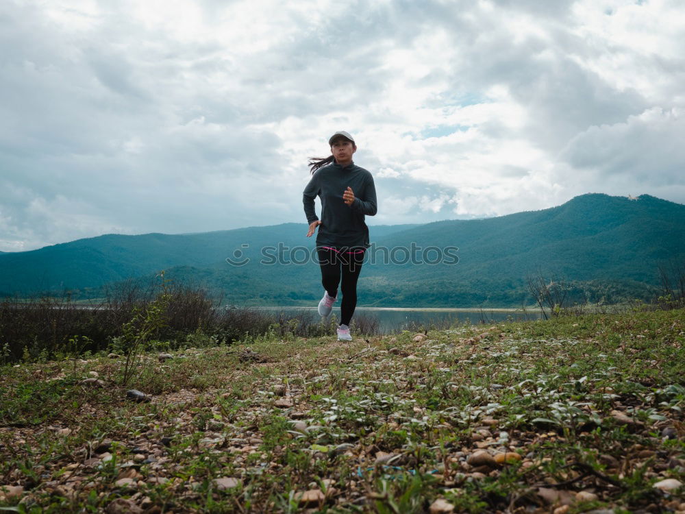 Similar – Man running on railroad