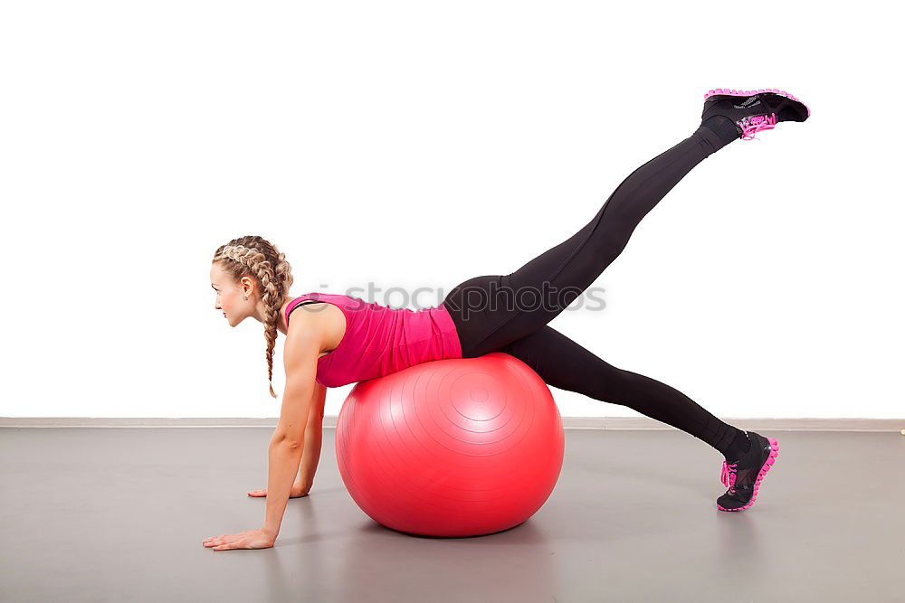Similar – Image, Stock Photo Young sporty woman doing exercises with a latex band