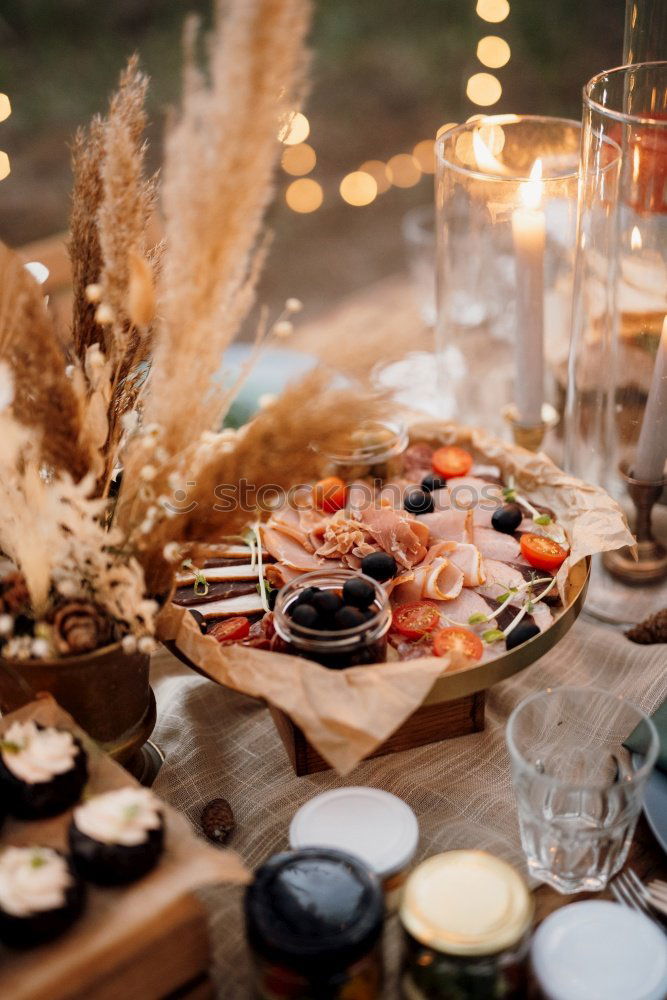 Similar – Group of People enjoying food and wine at restaurant