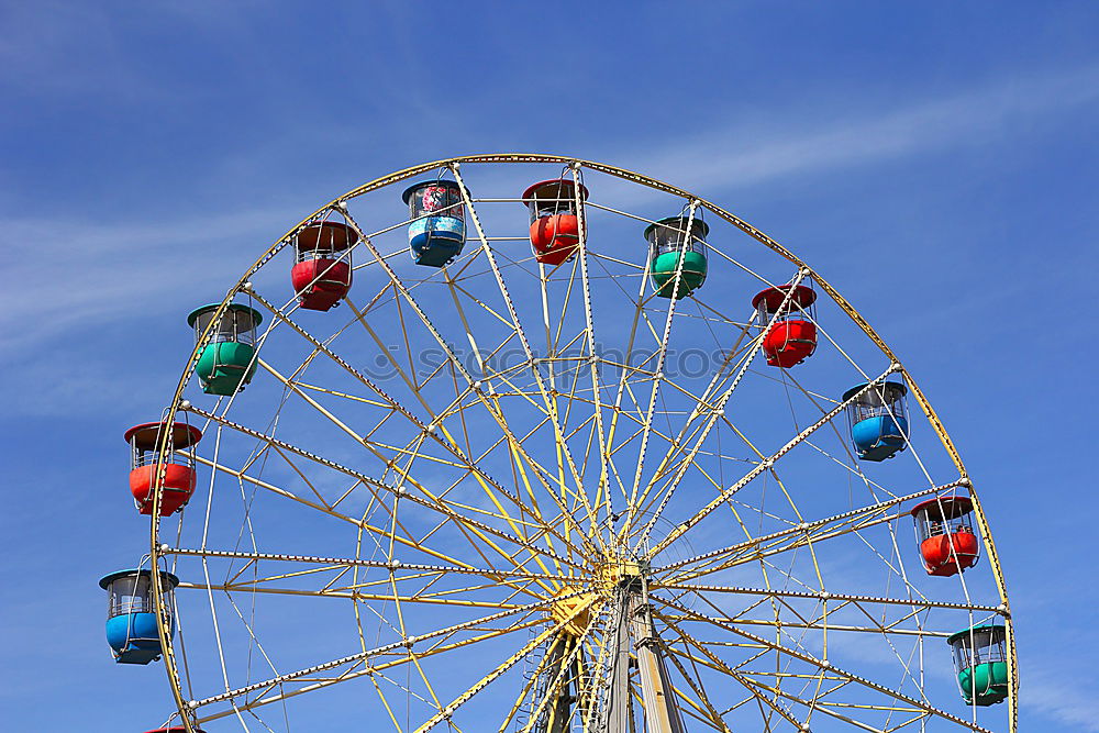 Similar – Twirly swing ride Blue sky