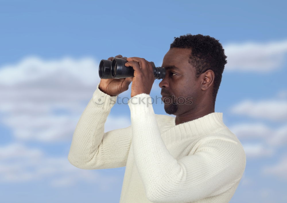 Similar – Young modern man sitting on halfpipe taking picture with Camera