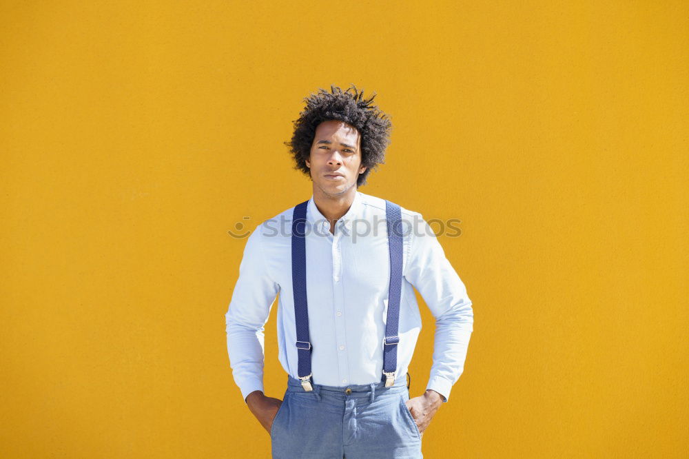 Similar – Image, Stock Photo Portrait of handsome afro man using his mobile.