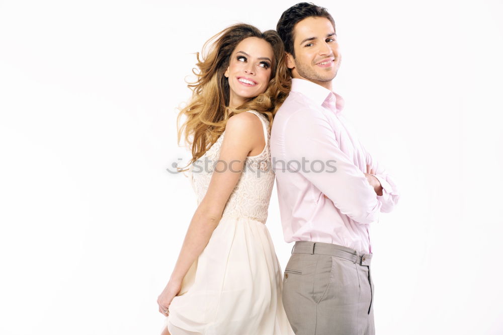 Similar – Image, Stock Photo Beautiful young couple hugging, looking at camera and smiling