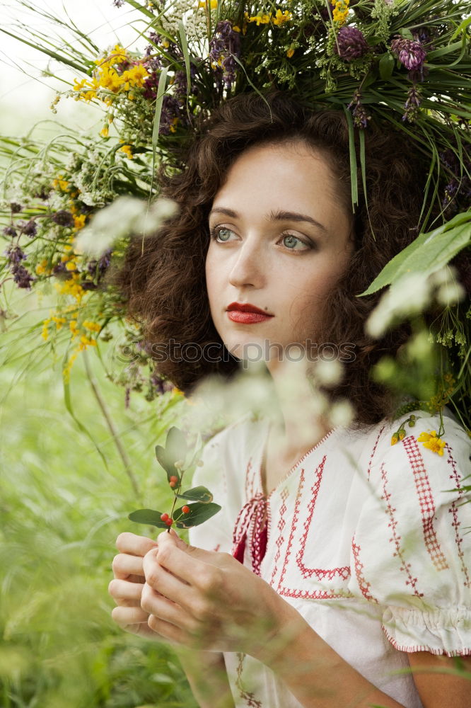 Similar – Image, Stock Photo Lifestyle portrait of happy young adult woman enjoying flowers
