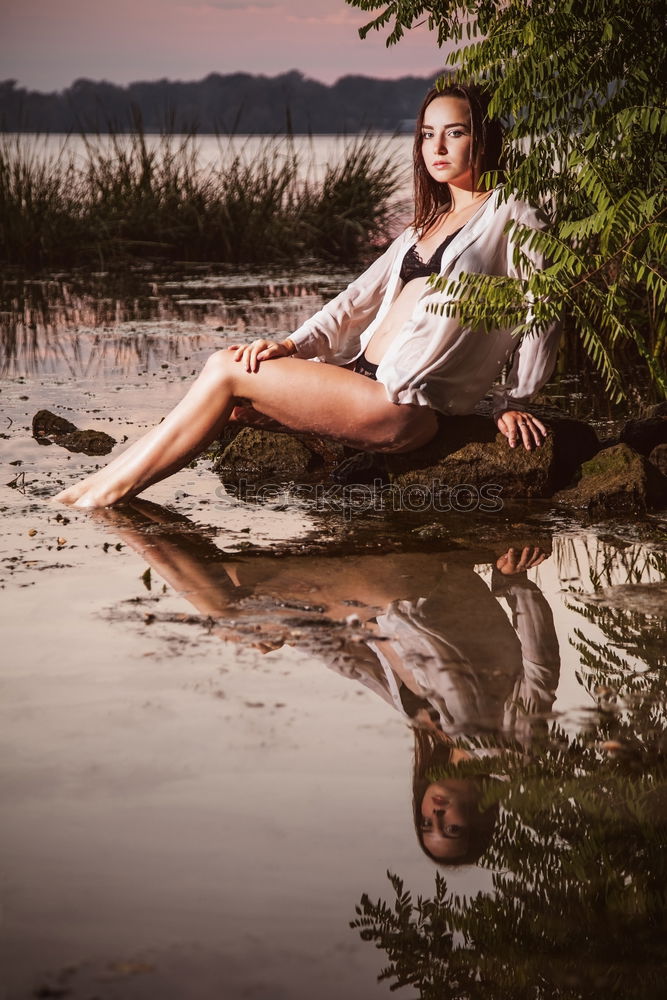 Similar – Image, Stock Photo Young woman in summer dress sitting on the banks of the Rhine with her feet in the river