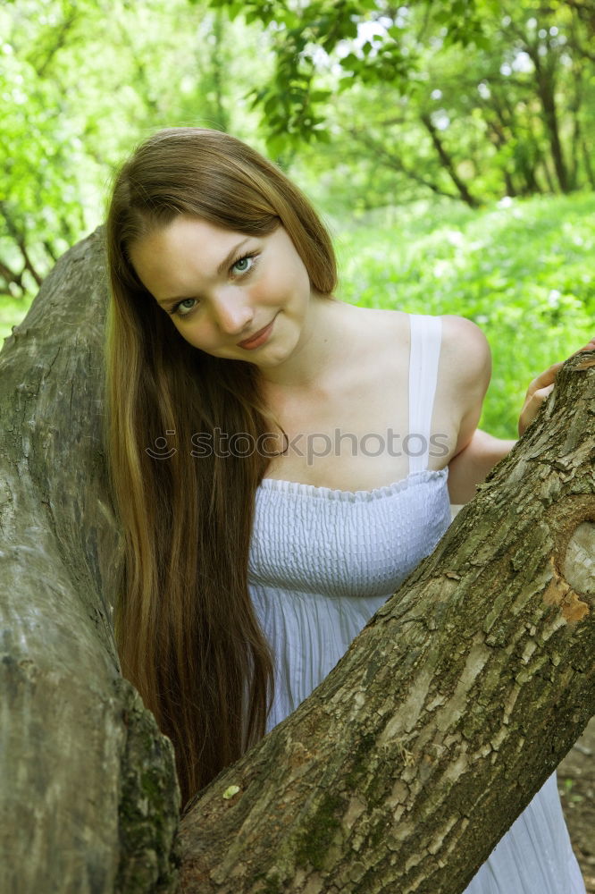 Similar – Summer portrait of long haired teen girl with short jeans shorts and belly top in park