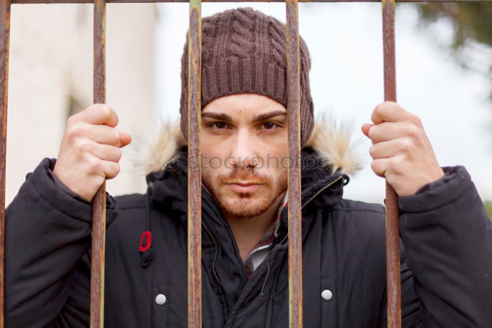 Similar – Young man posing outdoors