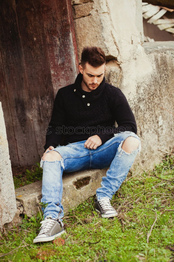 Similar – young man wearing suspenders in urban background