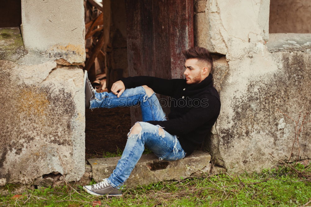 Similar – young man wearing suspenders in urban background