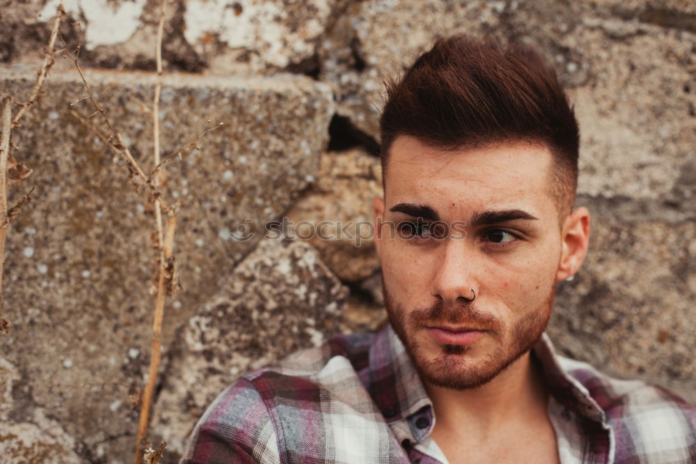 Similar – young man wearing suspenders in urban background