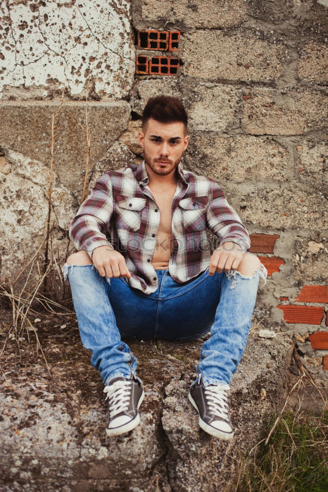 Similar – young man wearing suspenders in urban background