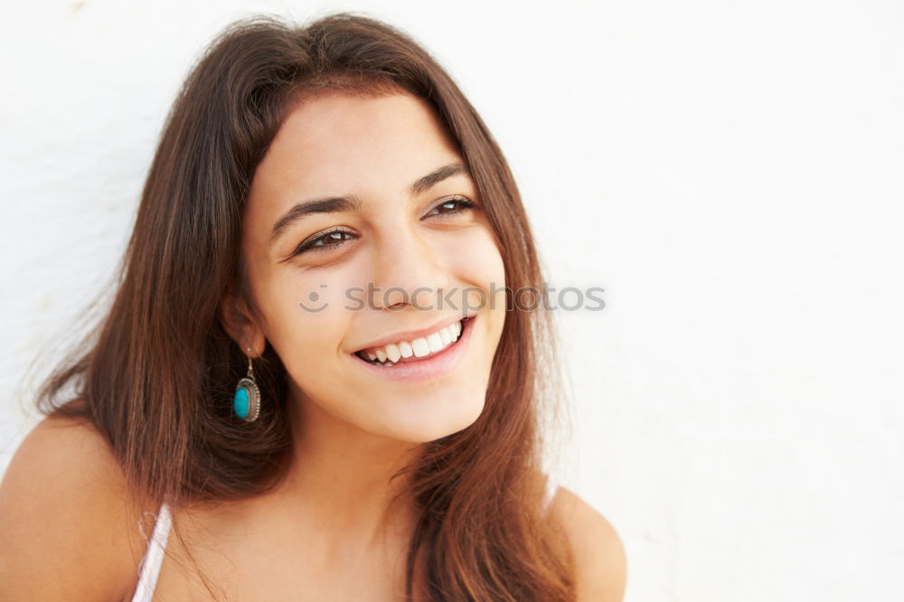 Similar – Girl with blue eyes smiling sitting on urban step