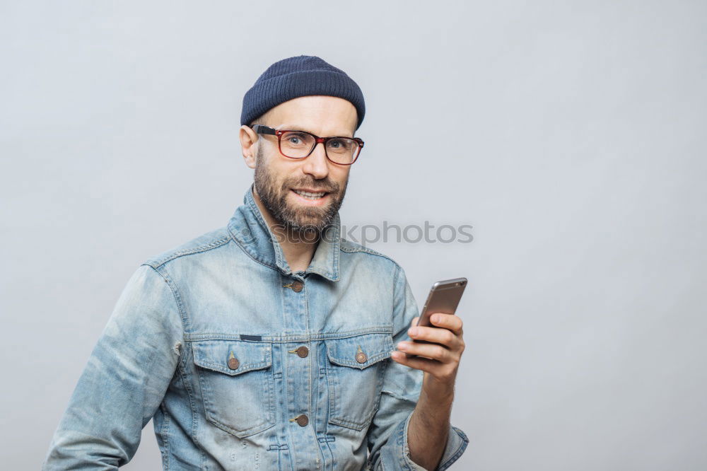 Similar – Image, Stock Photo Portrait of a man with mustache using his smartphone.