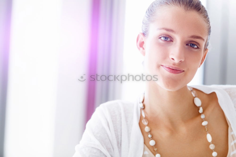 Similar – Young thoughtful woman looking through the window