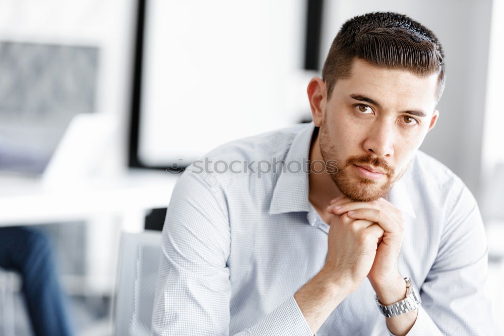 Similar – Bearded man in sunglasses looking at the window