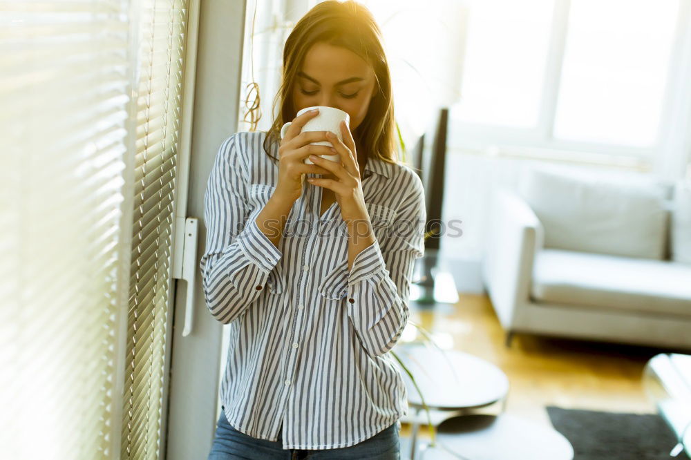 Similar – child girl having breakfast at home