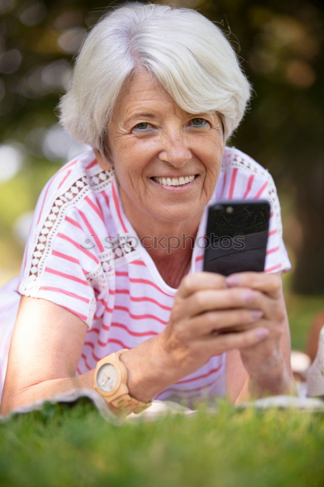 Similar – Senior citizen with smartphone